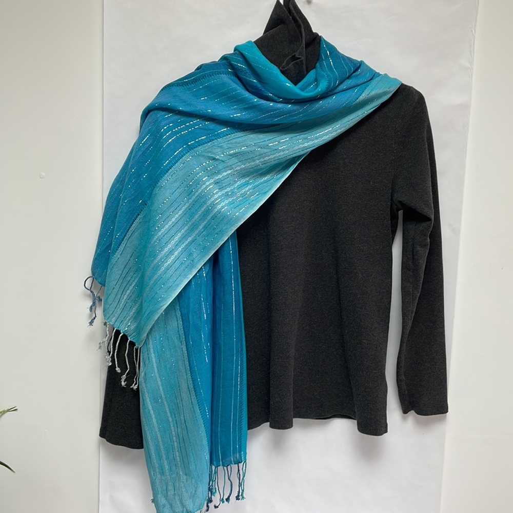 Free add on to Bundle. Soft multi hued turquoise scarf with silver threads.